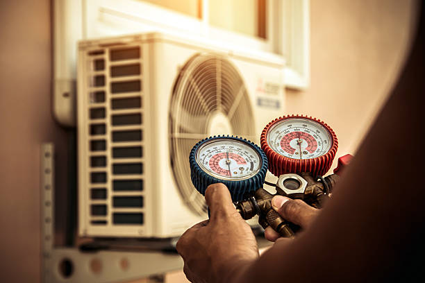 Professional Hvac Maintenance technician working in Saint John, IN